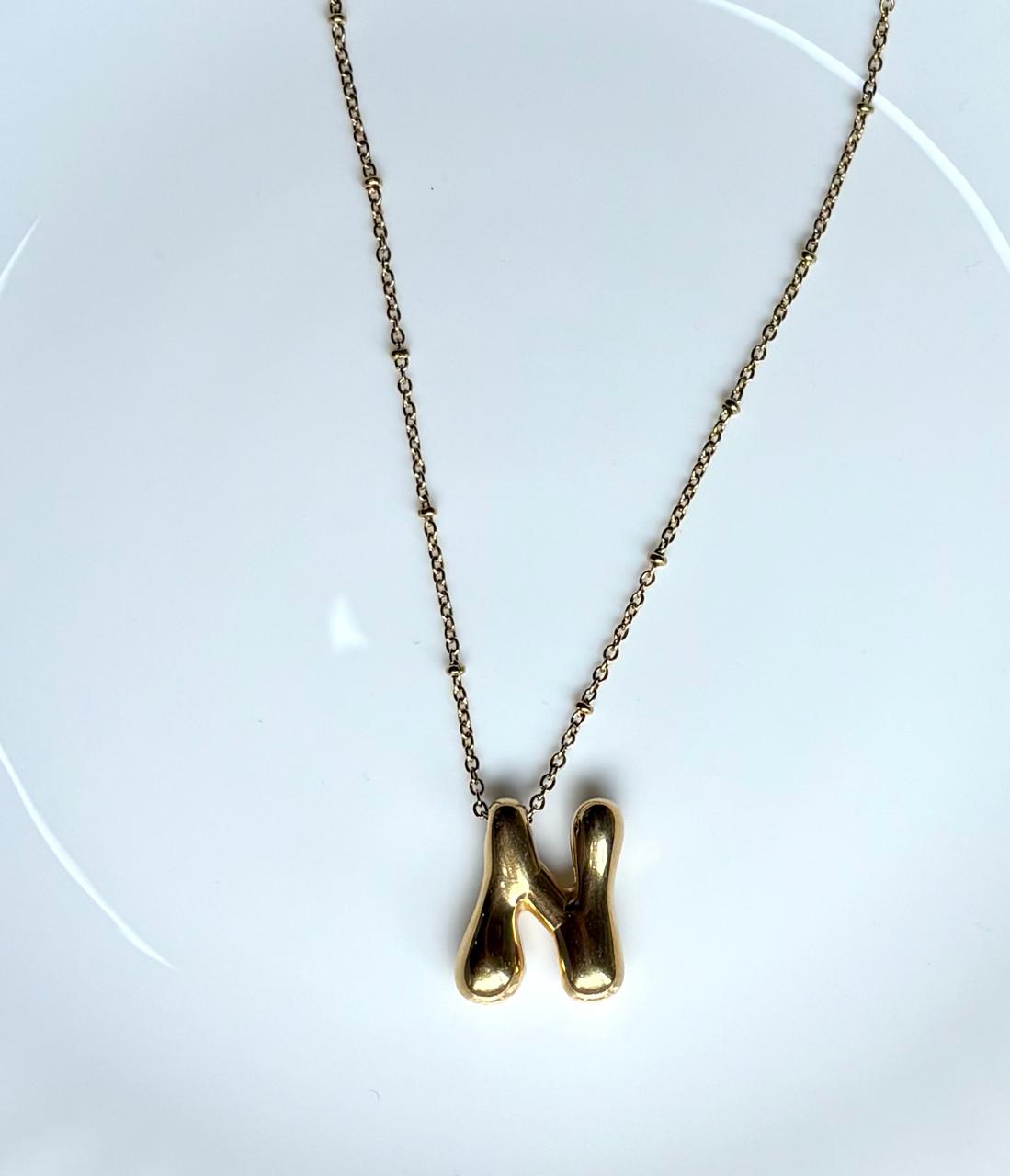 Golden Flow Initial Necklace – N