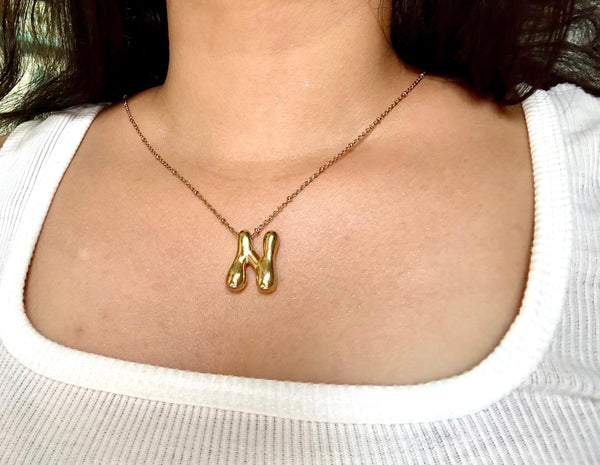 Golden Flow Initial Necklace – N