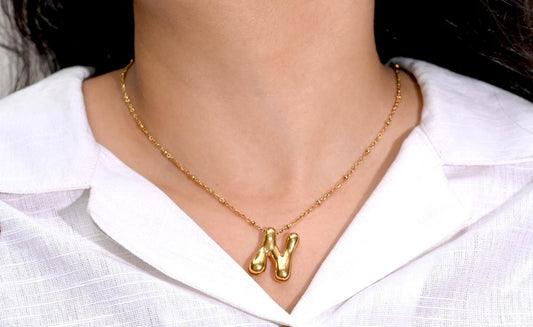 Golden Flow Initial Necklace – N