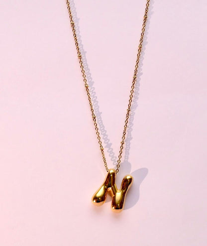 Golden Flow Initial Necklace – N